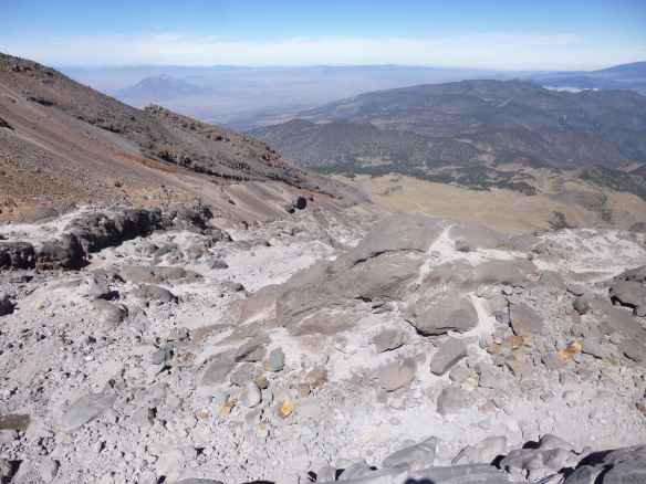 Heading down the mountain through scree fields.